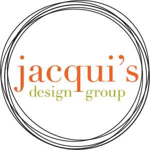 Logo for Jacqui's Design Group: orange 'jacqui's' text with lime-green 'design group' beneath, all within a dark circular outline.