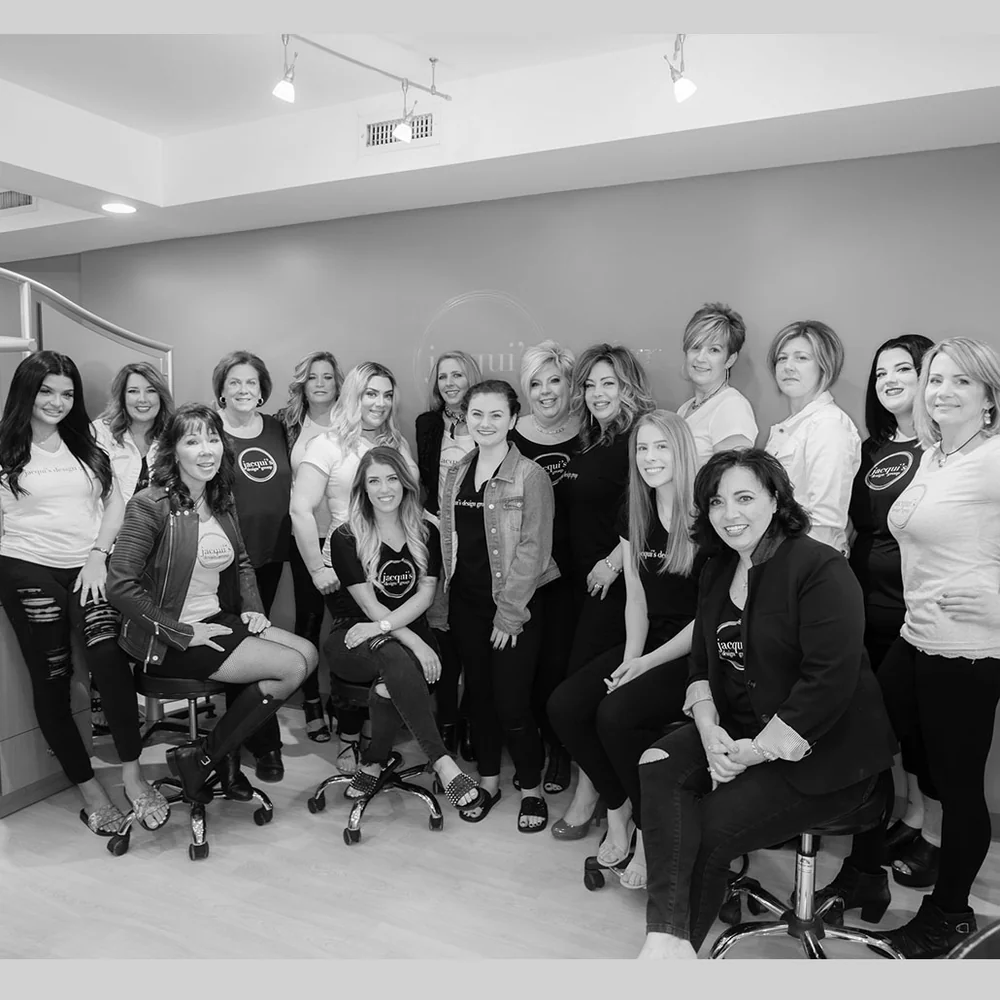 The full stylist team inside Jacqui's Design Group in Arlington, MA